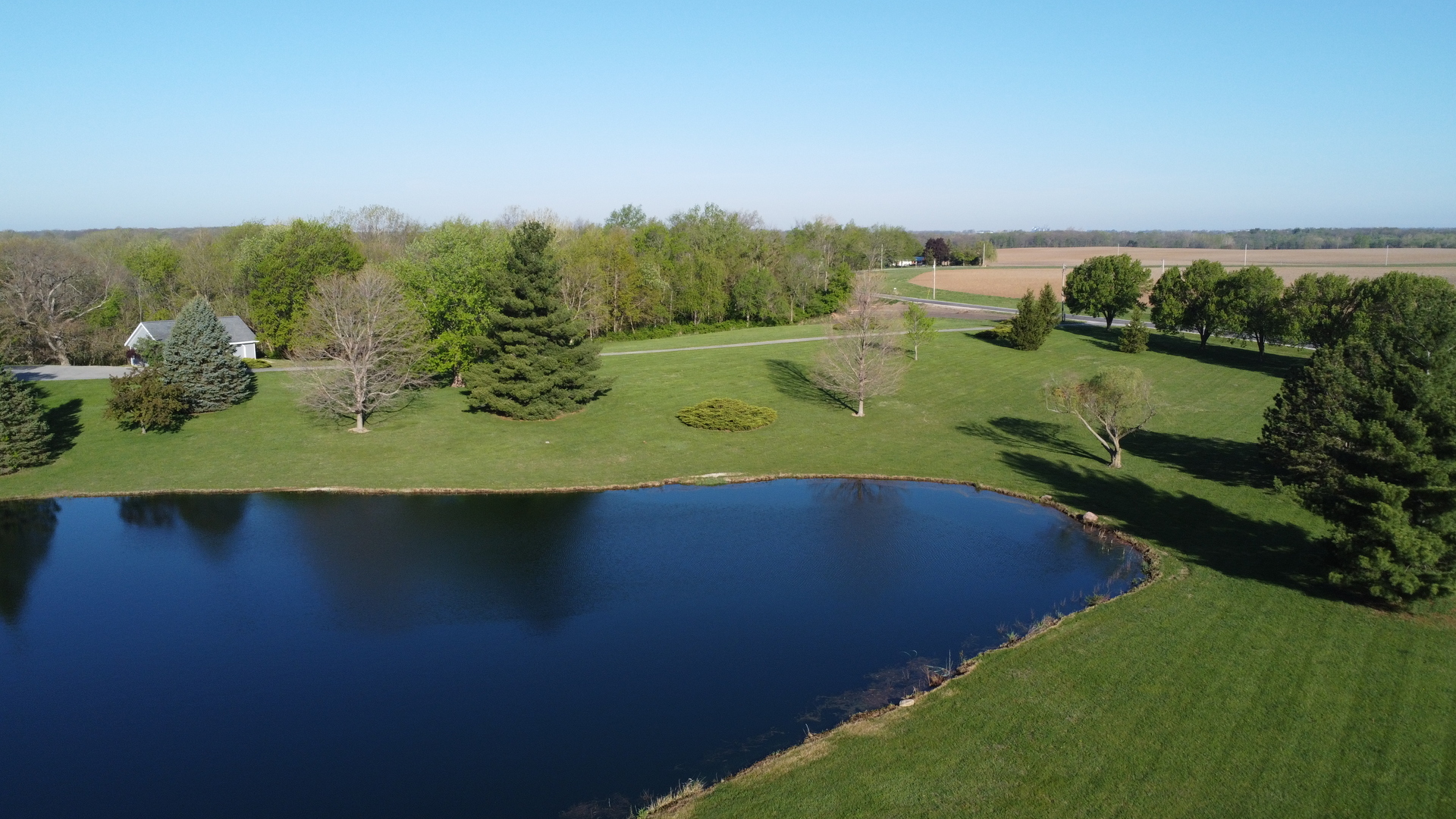 17539 East 2600 North Road Lexington, IL 61753 - Photo 94 of 97 an aerial view of a houses with outdoor space and trees all around