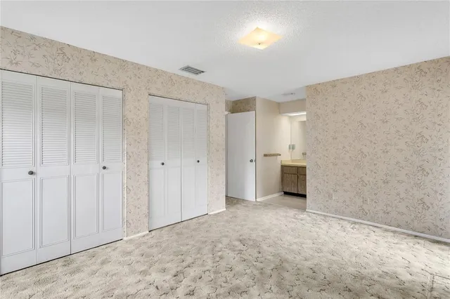 a view of a room with cabinets