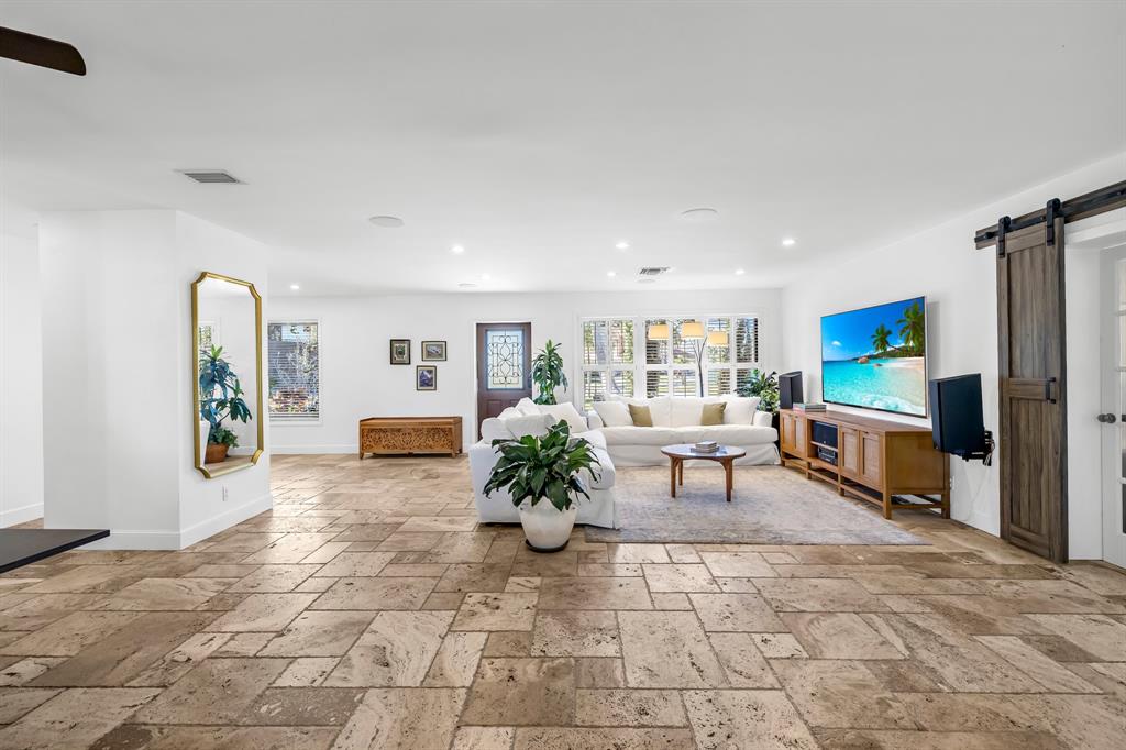2801 Northeast 48th Court Lighthouse Point, FL 33064 - Photo 11 of 50 a living room with furniture and a potted plant