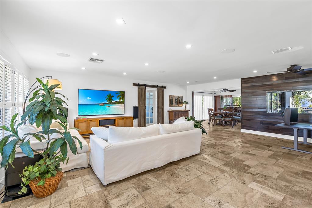 2801 Northeast 48th Court Lighthouse Point, FL 33064 - Photo 8 of 50 a living room with furniture and a potted plant