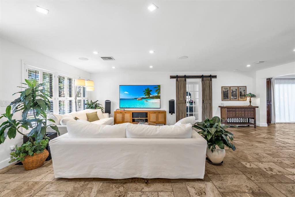 2801 Northeast 48th Court Lighthouse Point, FL 33064 - Photo 9 of 50 a living room with furniture and a potted plant