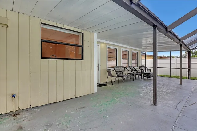 a view of livingroom with furniture and windows