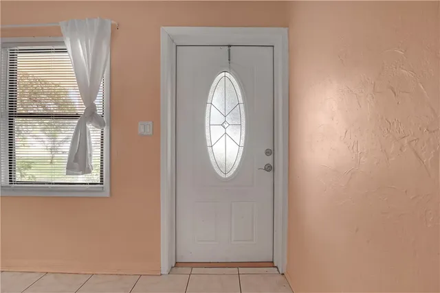 a view of empty room with windows