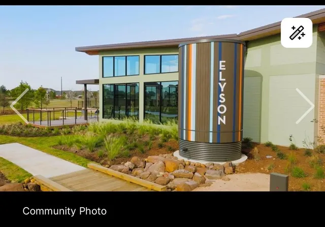 a view of a house with backyard porch and sitting area