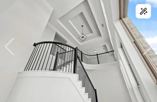 a view of staircase with large window
