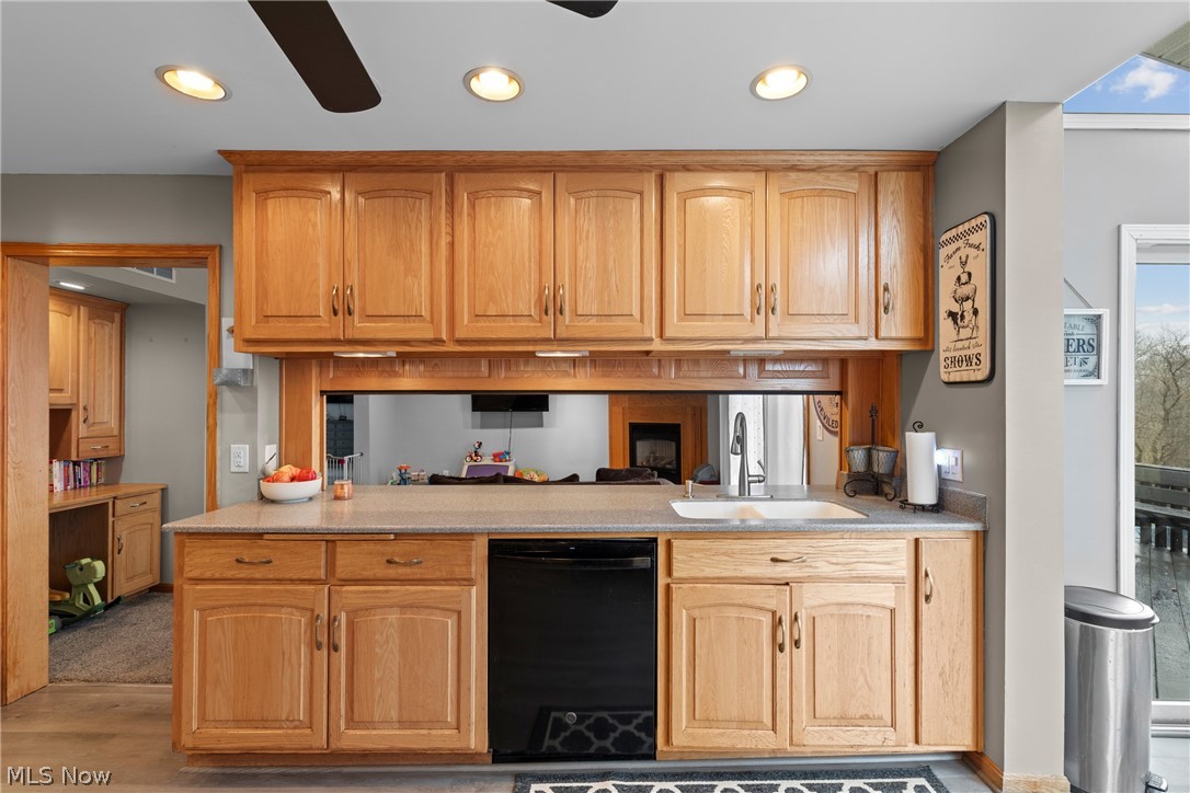 64508 Slade Road Cambridge, OH 43725 - Photo 12 of 50 Kitchen featuring black dishwasher, ceiling fan, light stone countertops, and recessed lighting