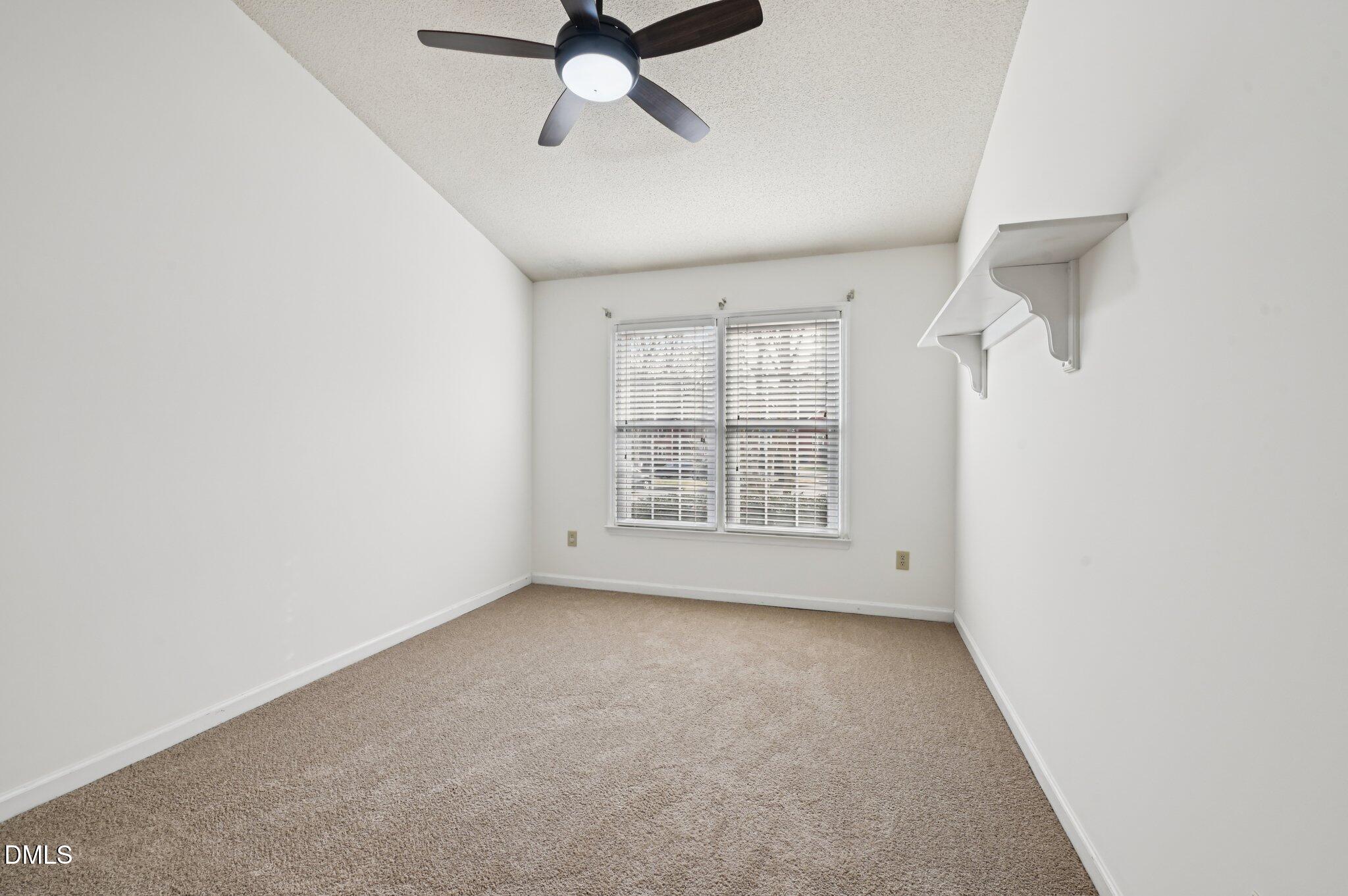 135 Long Shadow Place Durham, NC 27713 - Photo 13 of 23 an empty room with a window