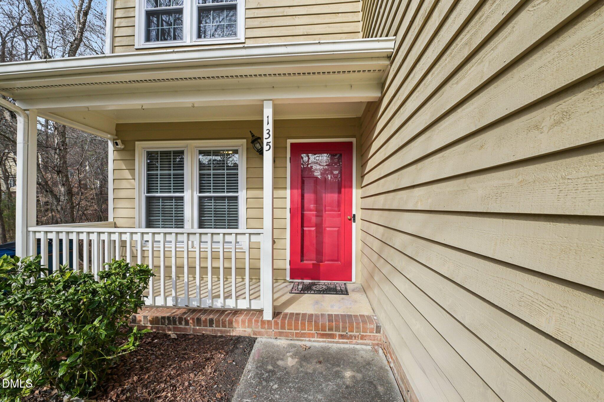 135 Long Shadow Place Durham, NC 27713 - Photo 2 of 23 a view of a house with a small porch