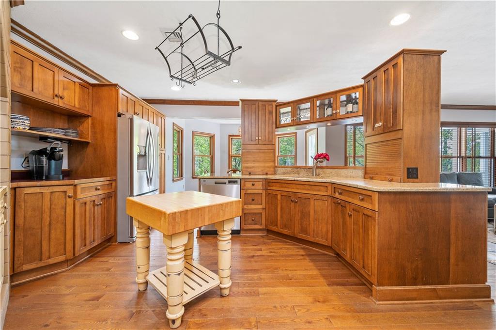 103 Golfview Drive Gibsonia, PA 15044 - Photo 11 of 33 a kitchen with stainless steel appliances granite countertop a sink and cabinets