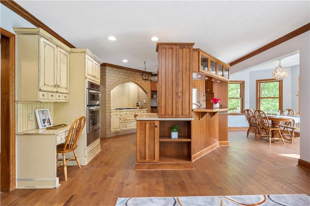 103 Golfview Drive Gibsonia, PA 15044 - Photo 13 of 33 a living room with furniture a dining table with wooden floor