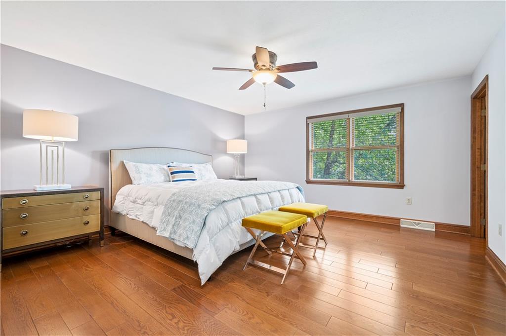 103 Golfview Drive Gibsonia, PA 15044 - Photo 17 of 33 a bedroom with a bed and a window