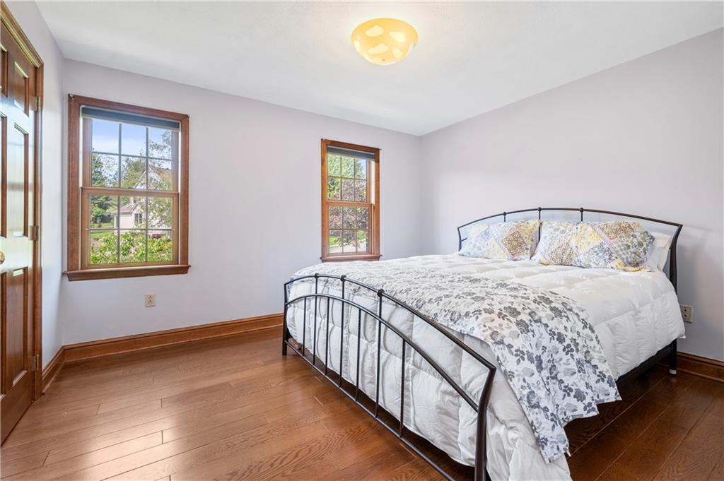 103 Golfview Drive Gibsonia, PA 15044 - Photo 20 of 33 a bedroom with a bed and a window