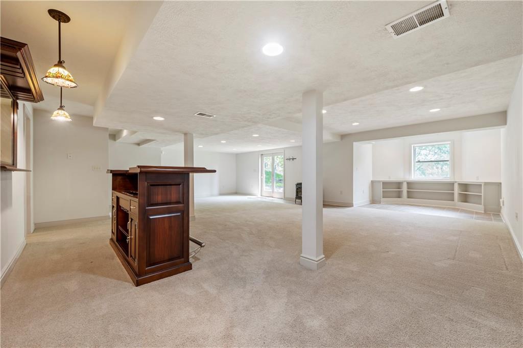 103 Golfview Drive Gibsonia, PA 15044 - Photo 25 of 33 a living room with furniture and a large window