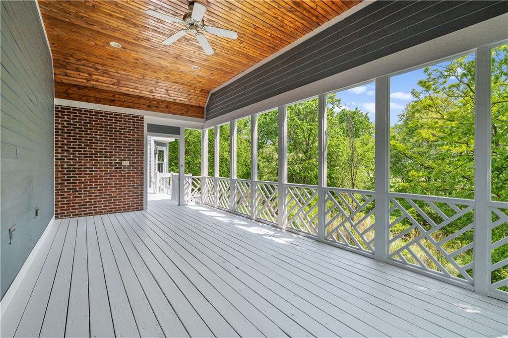 103 Golfview Drive Gibsonia, PA 15044 - Photo 30 of 33 a view of porch with wooden floor in front of a house