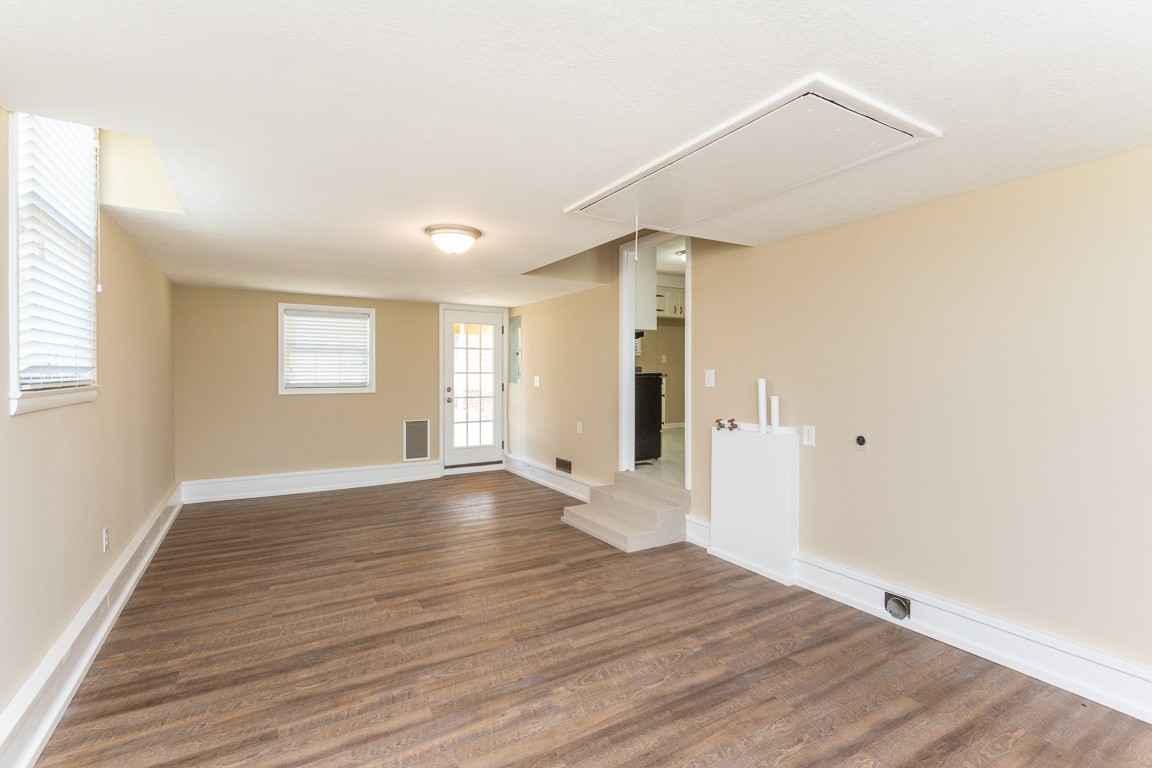 20 Binks Drive Clarksville, TN 37042 - Photo 15 of 35 an empty room with wooden floor and windows