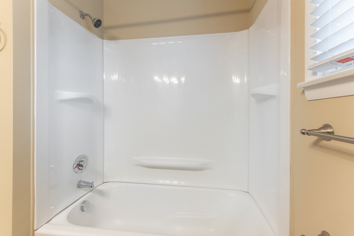 20 Binks Drive Clarksville, TN 37042 - Photo 21 of 35 a bathroom with a tub and a shower