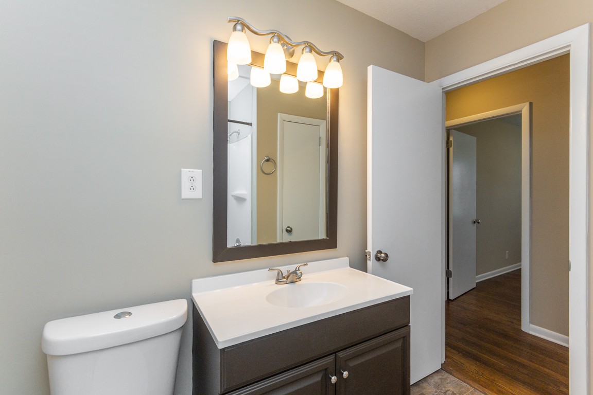 20 Binks Drive Clarksville, TN 37042 - Photo 22 of 35 a bathroom with a sink and a mirror