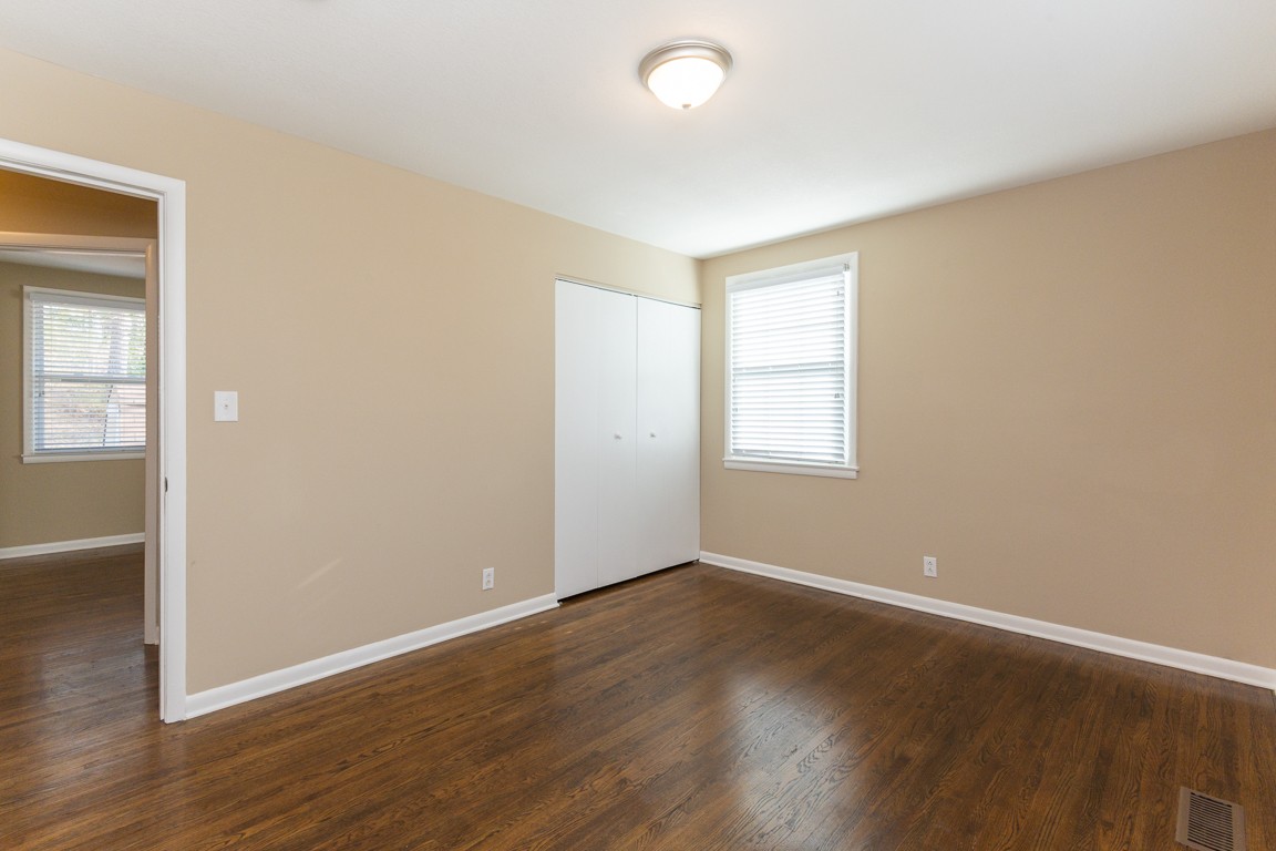 20 Binks Drive Clarksville, TN 37042 - Photo 24 of 35 an empty room with wooden floor and windows