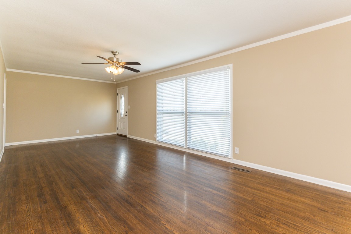 20 Binks Drive Clarksville, TN 37042 - Photo 4 of 35 wooden floor in an empty room with a window