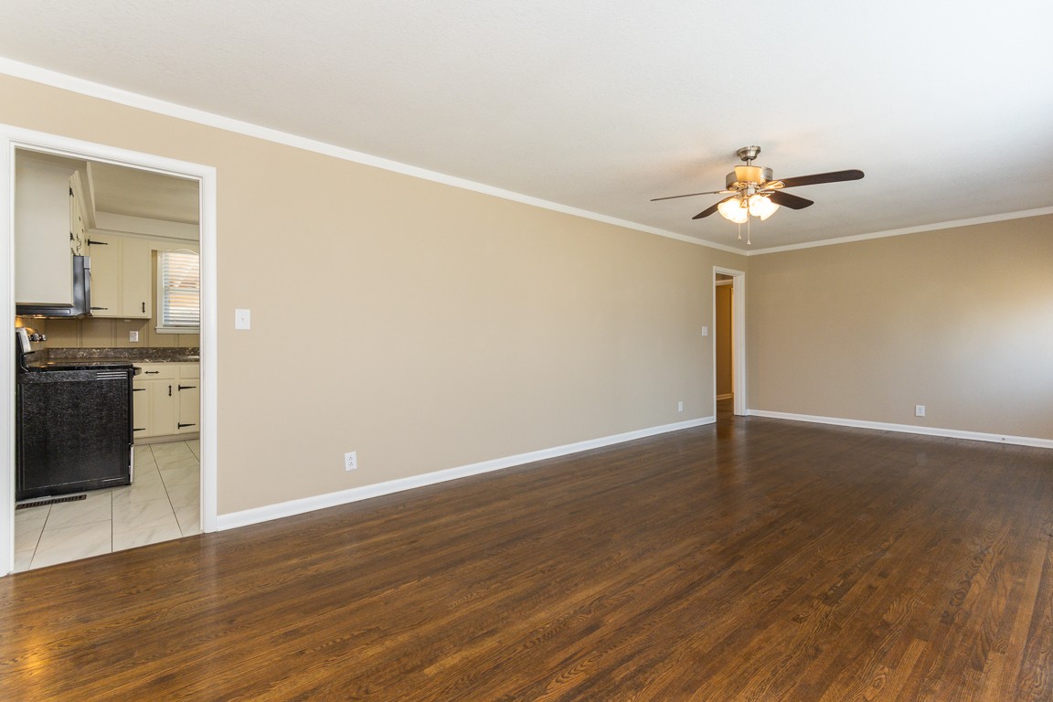 20 Binks Drive Clarksville, TN 37042 - Photo 5 of 35 a view of a room with wooden floor and a ceiling fan