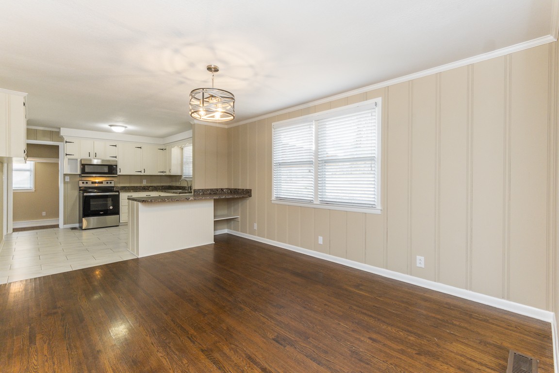 20 Binks Drive Clarksville, TN 37042 - Photo 6 of 35 a view of a kitchen with a sink stove cabinets and empty room