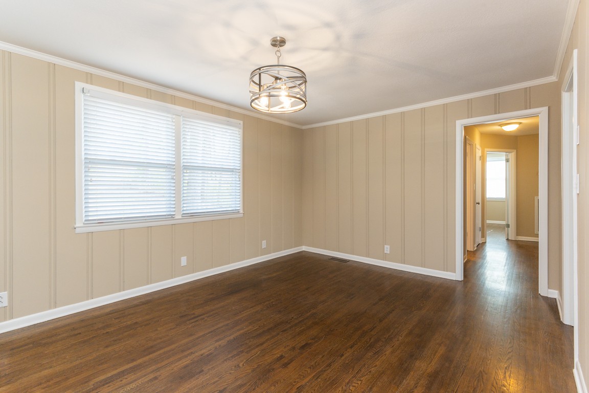 20 Binks Drive Clarksville, TN 37042 - Photo 7 of 35 wooden floor in an empty room with a window