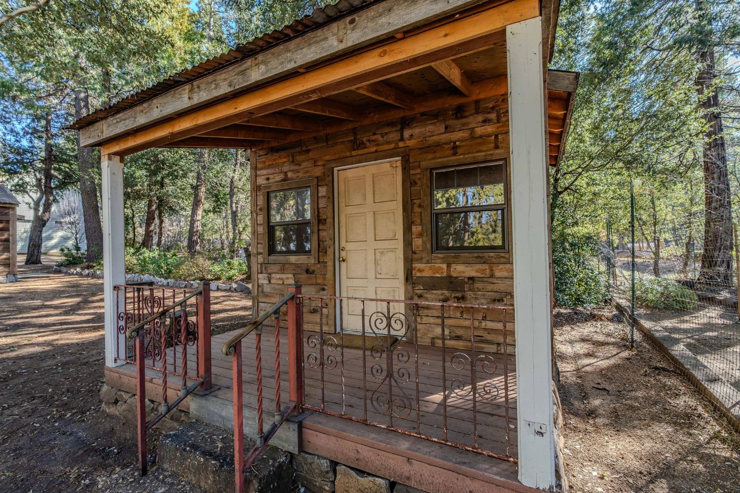 24985 Shake Ridge Road Volcano, CA 95689 - Photo 15 of 92 a view of a patio with a table and chairs