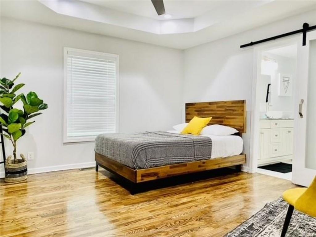 85 Meldon Avenue Southeast Atlanta, GA 30315 - Photo 16 of 23 a bedroom with a bed and a window