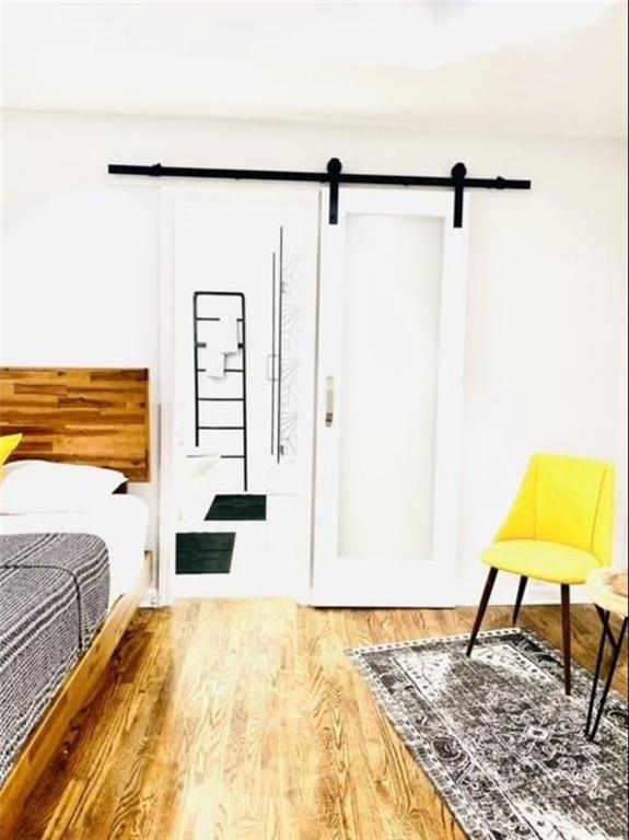 85 Meldon Avenue Southeast Atlanta, GA 30315 - Photo 19 of 23 a bedroom with a bed and walk in closet