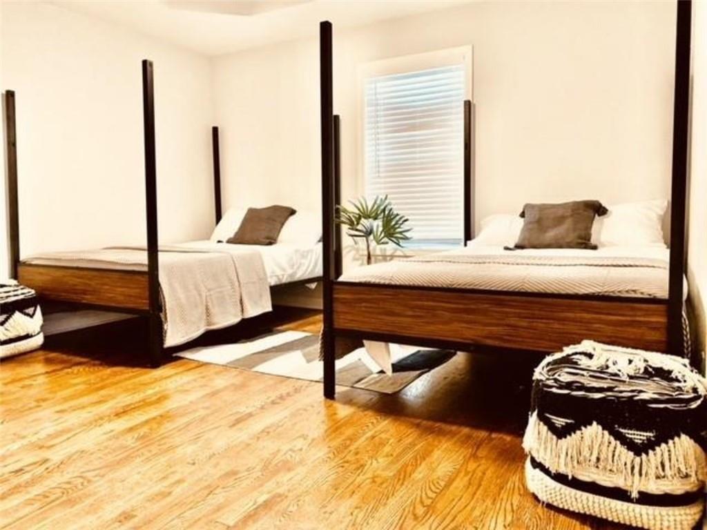 85 Meldon Avenue Southeast Atlanta, GA 30315 - Photo 21 of 23 a living room with a bed and a couch