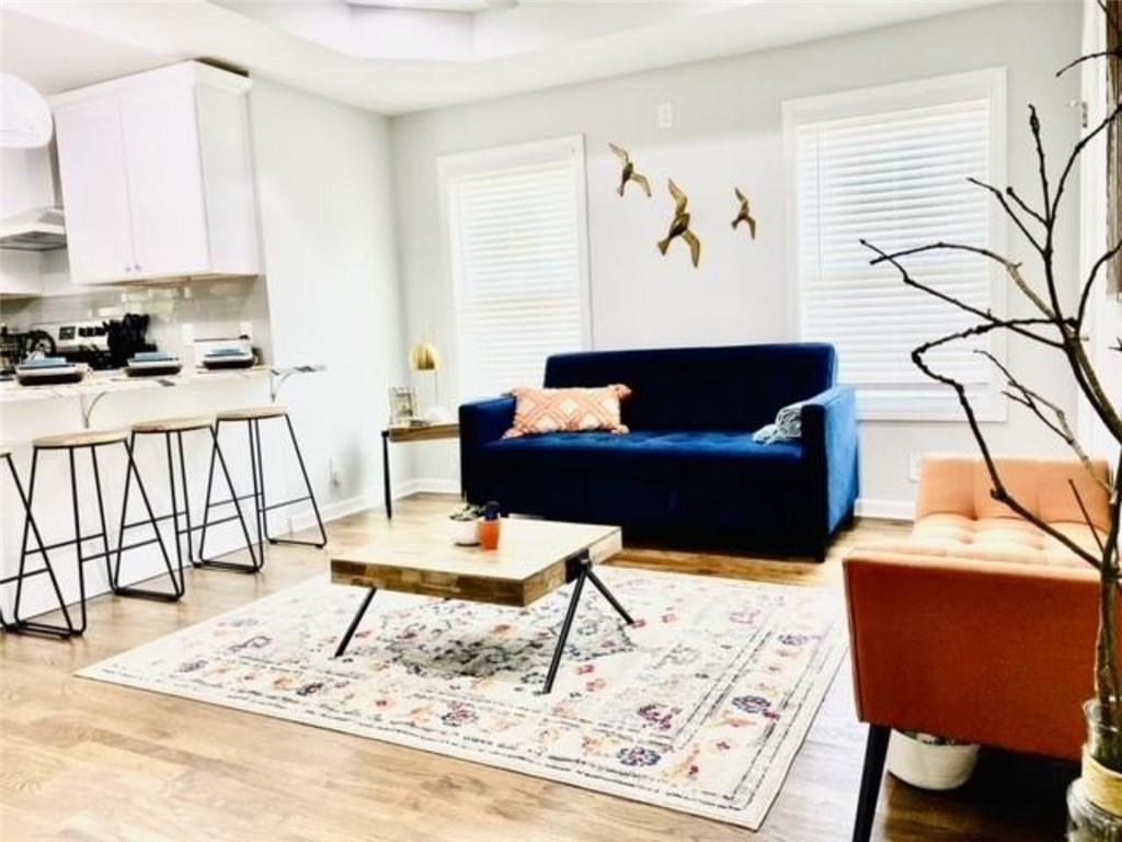 85 Meldon Avenue Southeast Atlanta, GA 30315 - Photo 8 of 23 a living room with furniture and a rug