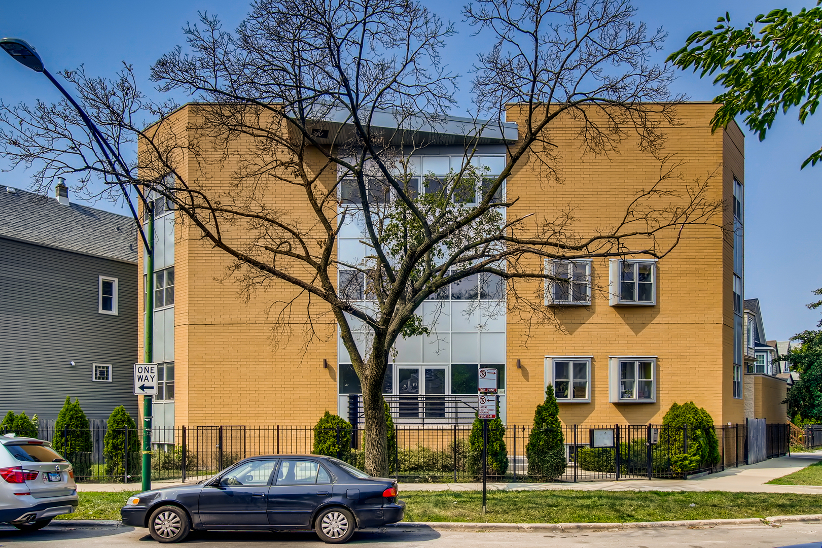 3744 West George Street, Unit D Chicago, IL 60618 - Photo 1 of 30 a view of multiple house with a yard