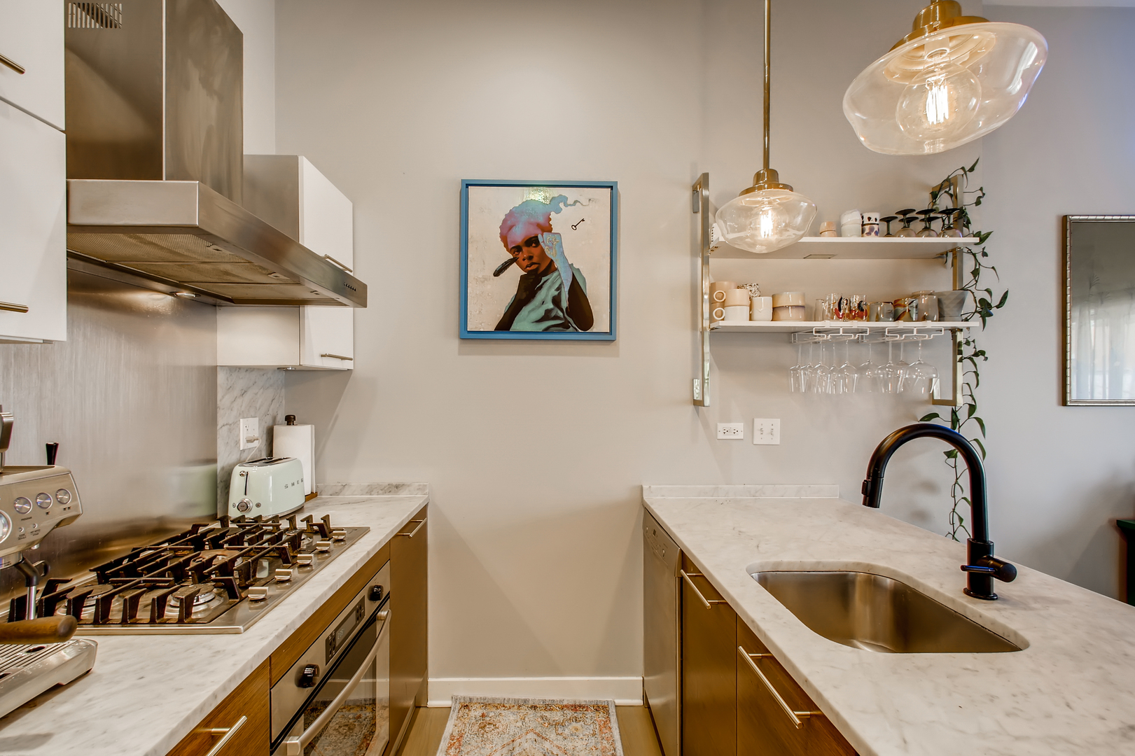 3744 West George Street, Unit D Chicago, IL 60618 - Photo 13 of 30 a kitchen with a stove and a sink