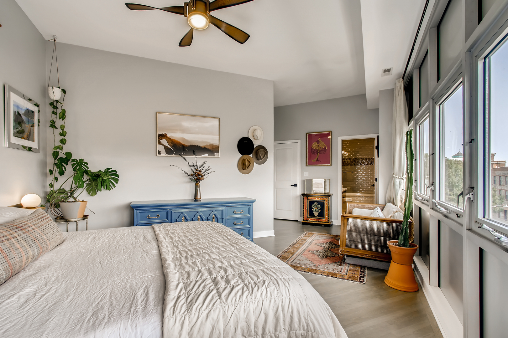 3744 West George Street, Unit D Chicago, IL 60618 - Photo 17 of 30 a bedroom with a bed couch and a fireplace