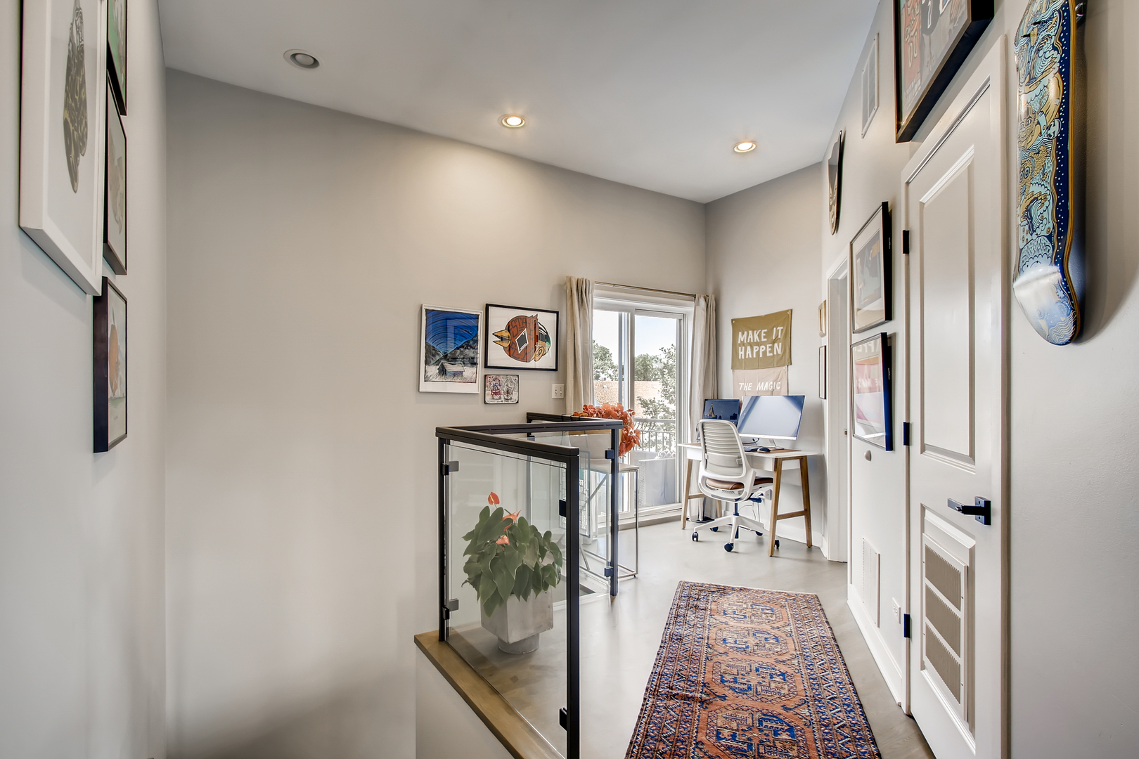3744 West George Street, Unit D Chicago, IL 60618 - Photo 25 of 30 a living room with furniture a rug and a painting on the wall