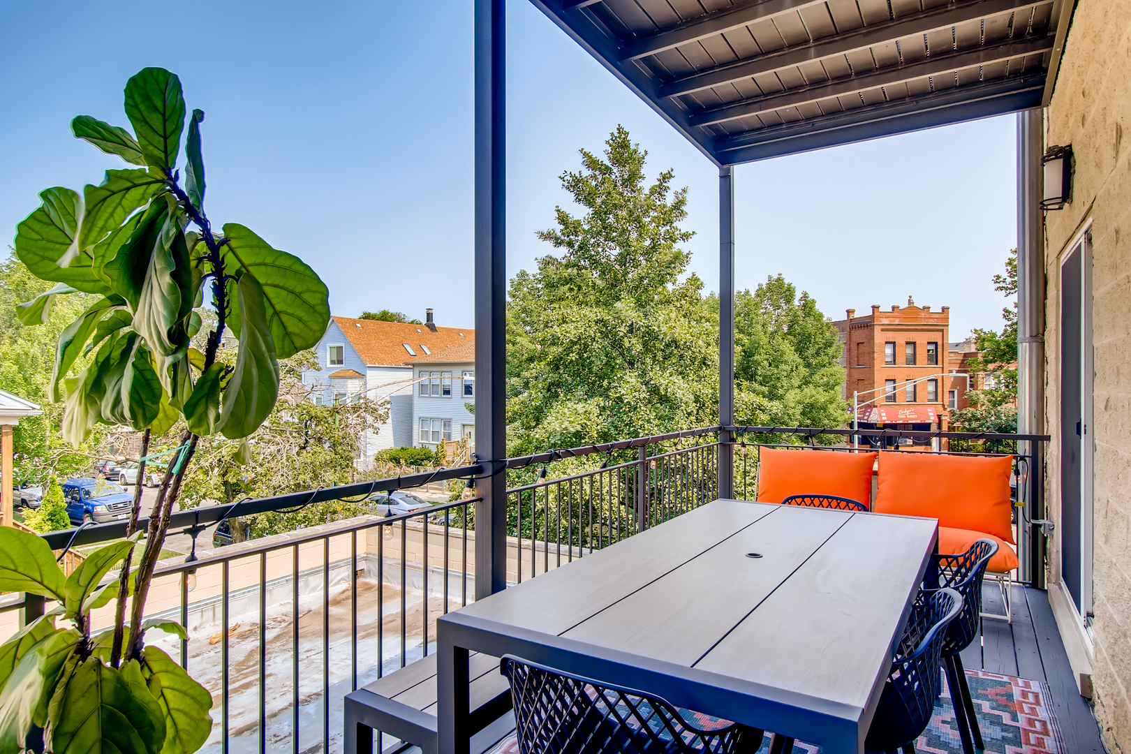 3744 West George Street, Unit D Chicago, IL 60618 - Photo 26 of 30 a view of a balcony with furniture