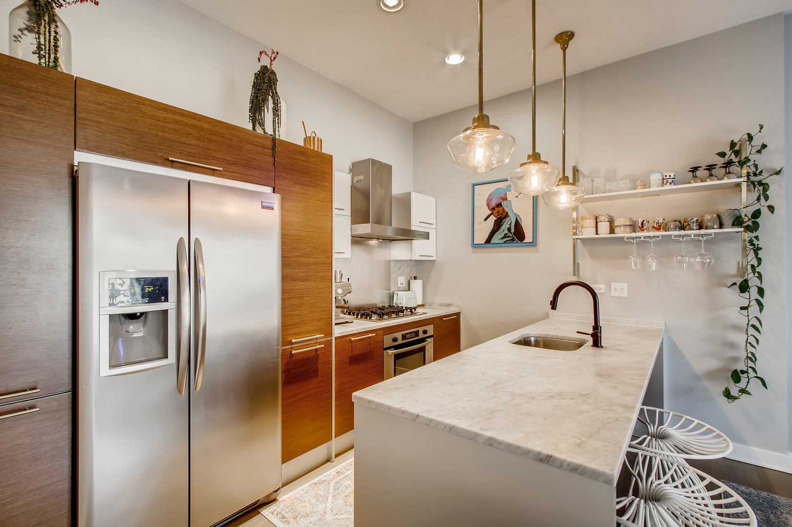 3744 West George Street, Unit D Chicago, IL 60618 - Photo 10 of 30 a kitchen with granite countertop a refrigerator and a sink