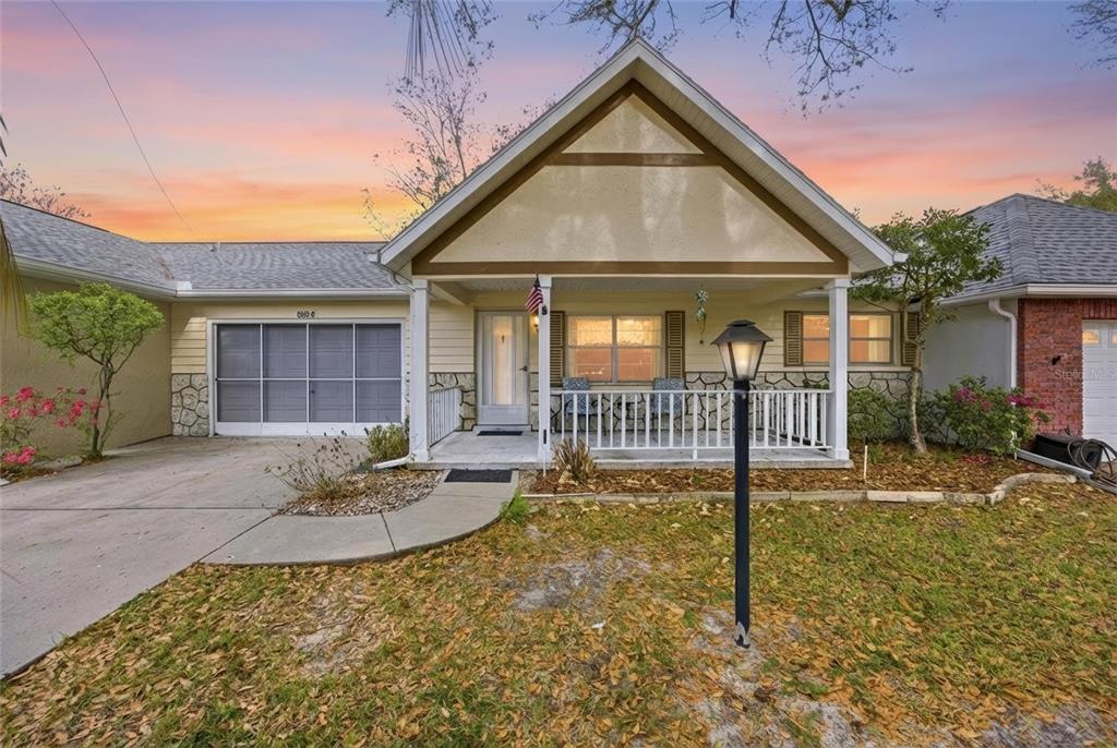 9580 Southwest 85th Avenue, Unit B Ocala, FL 34481 - Photo 1 of 1 a front view of a house with a yard