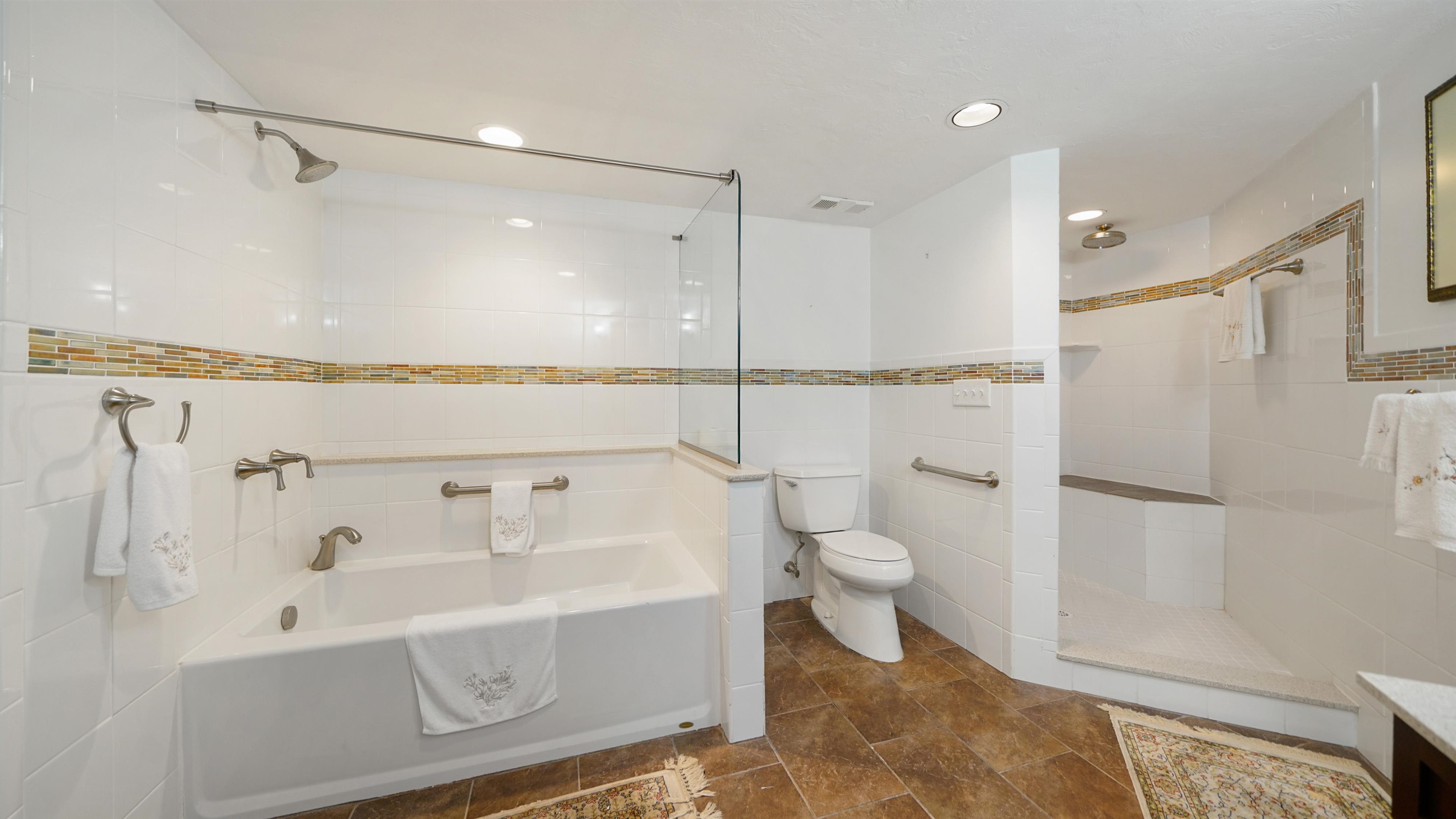 1 John Anderson Drive, Unit 218 Ormond Beach, FL 32176 - Photo 23 of 69 a bathroom with a shower a toilet and a shower