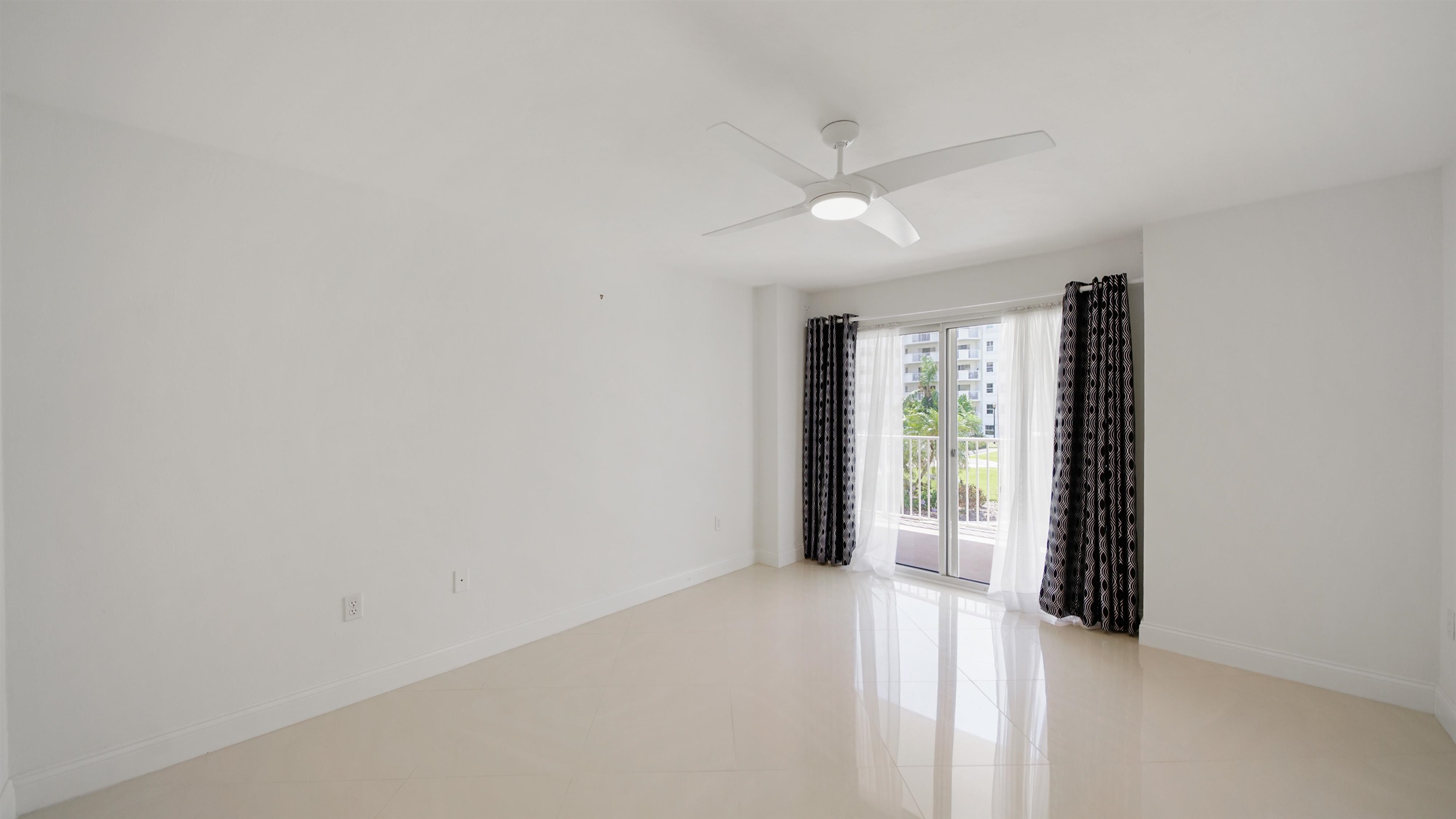 1 John Anderson Drive, Unit 218 Ormond Beach, FL 32176 - Photo 24 of 69 a view of an empty room with a window