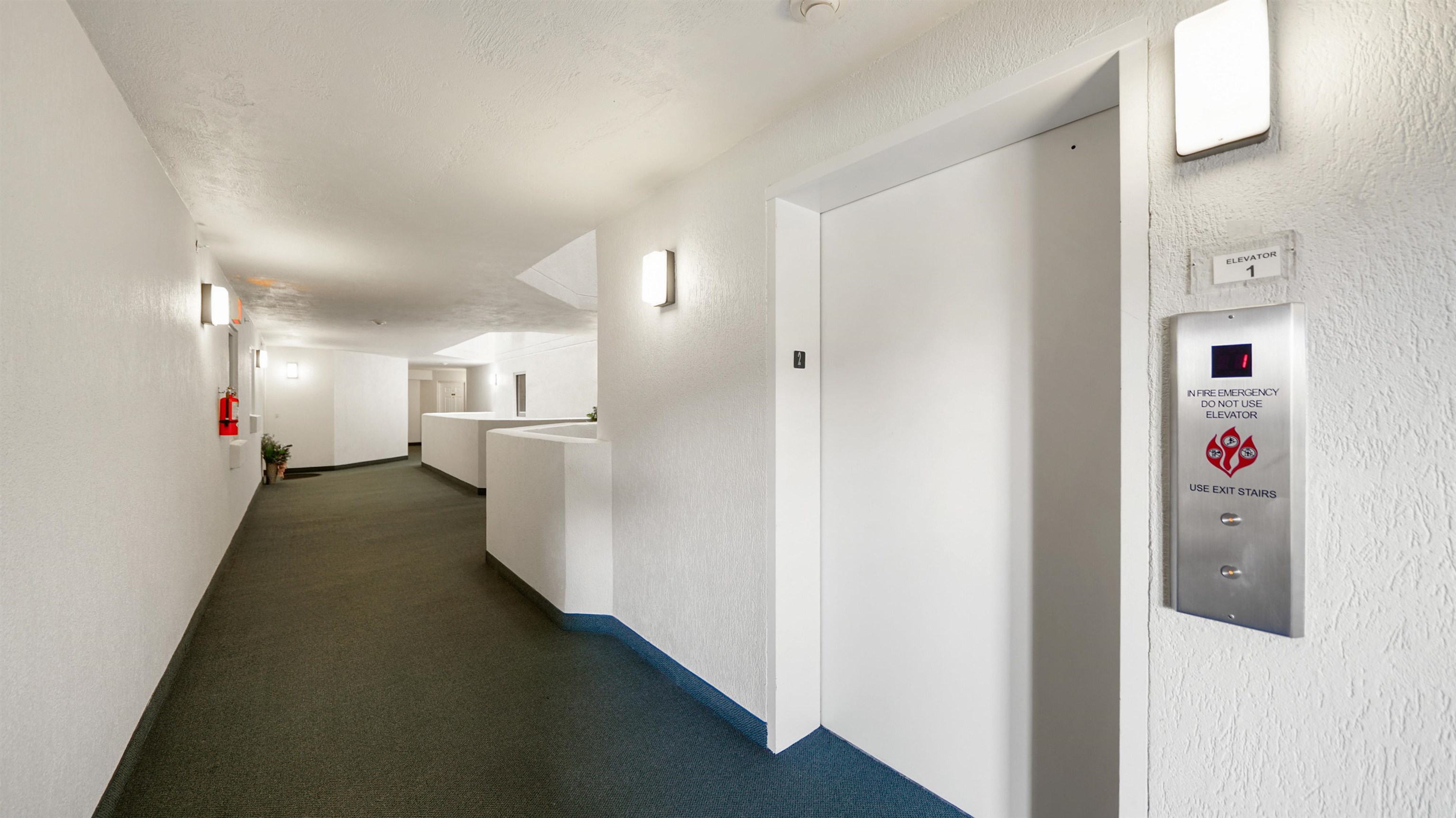 1 John Anderson Drive, Unit 218 Ormond Beach, FL 32176 - Photo 39 of 69 a view of a hallway with white walls