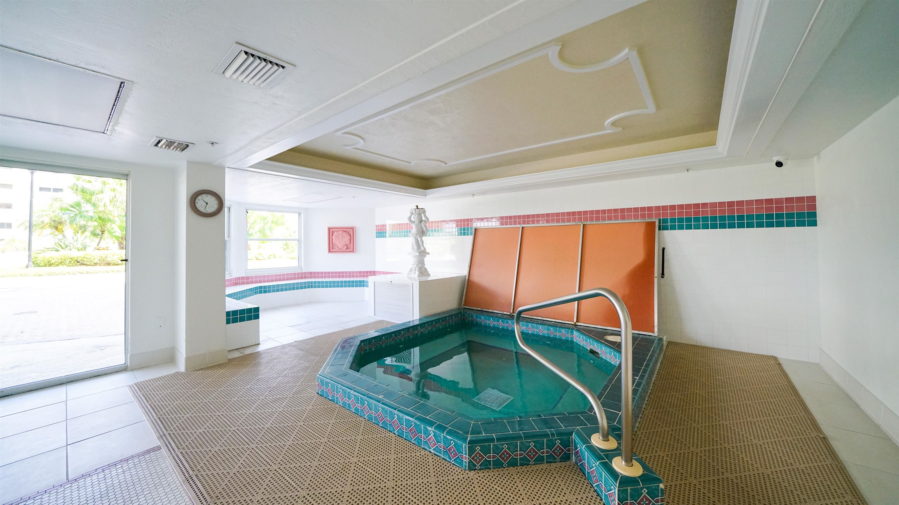 1 John Anderson Drive, Unit 218 Ormond Beach, FL 32176 - Photo 47 of 69 a living room with a couch and a table