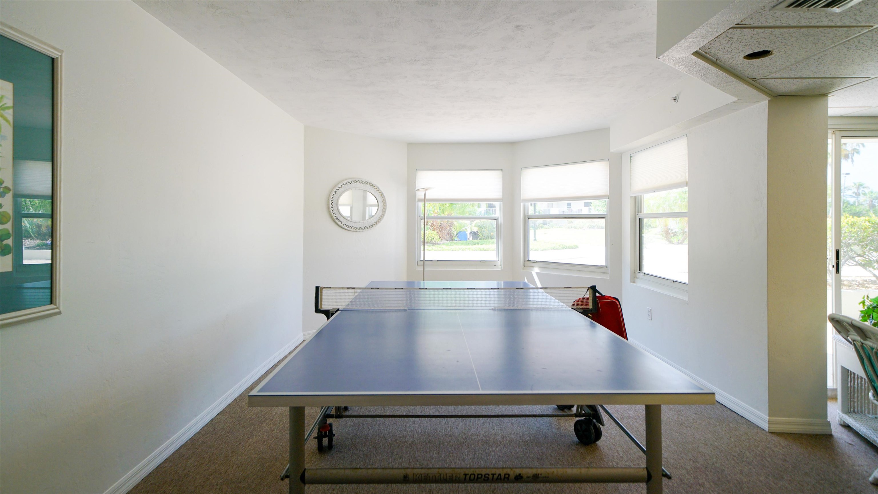 1 John Anderson Drive, Unit 218 Ormond Beach, FL 32176 - Photo 52 of 69 a room with pool table and windows