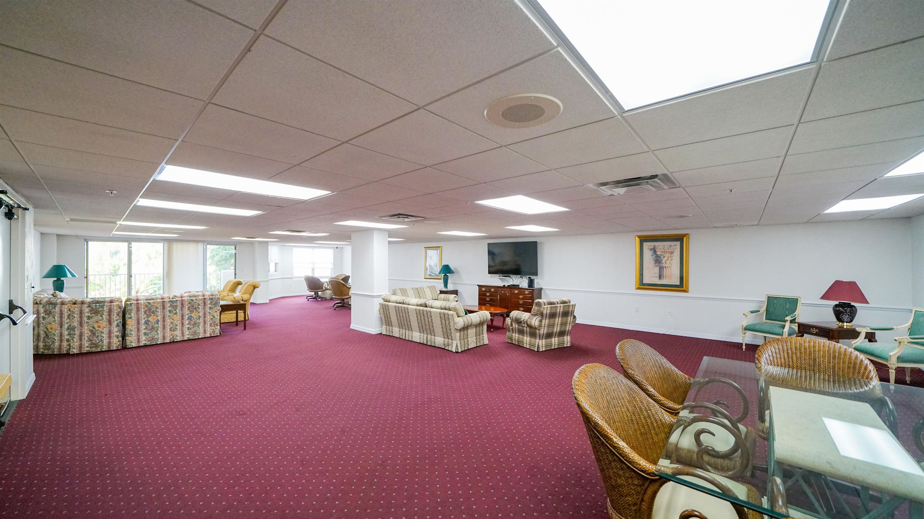 1 John Anderson Drive, Unit 218 Ormond Beach, FL 32176 - Photo 60 of 69 a living room with furniture and a table