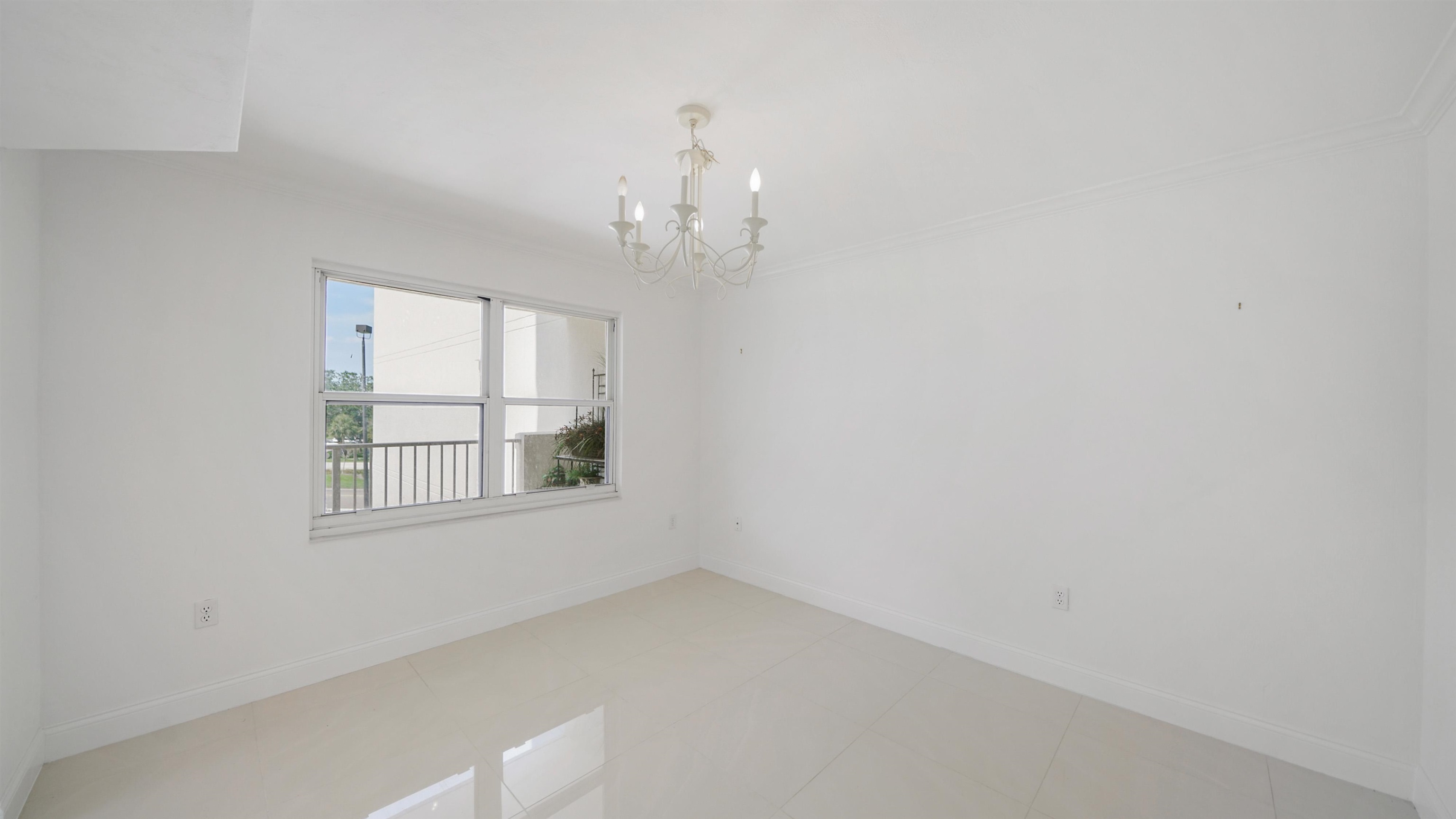 1 John Anderson Drive, Unit 218 Ormond Beach, FL 32176 - Photo 8 of 69 an empty room with a window