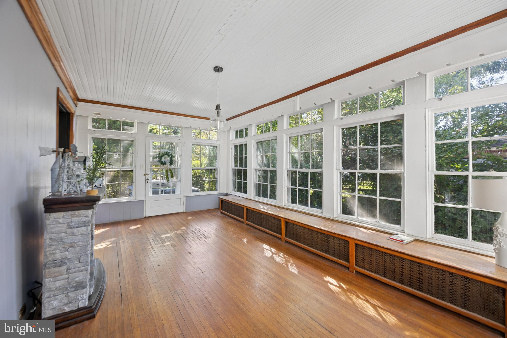 212 West 24th Street Chester, PA 19013 - Photo 6 of 30 a view of a large window with wooden floor