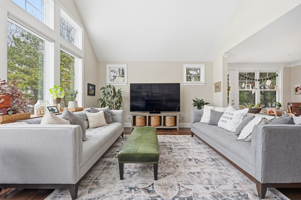 187 Rhode Island Road Lakeville, MA 02347 - Photo 15 of 42 a living room with furniture and a flat screen tv