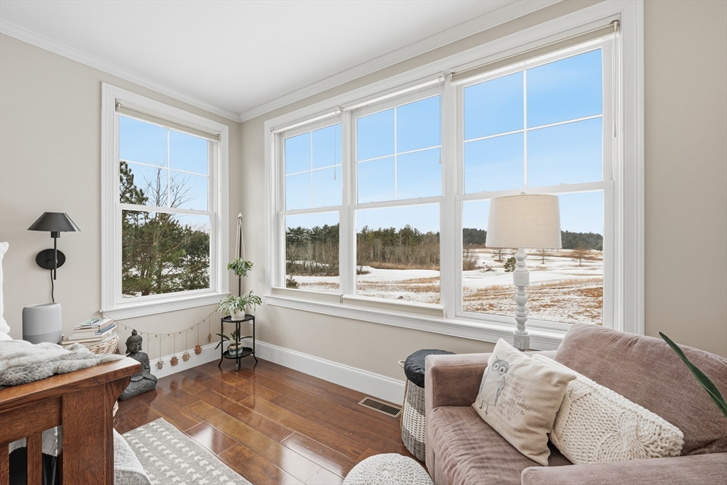 187 Rhode Island Road Lakeville, MA 02347 - Photo 21 of 42 a living room with furniture and a large window