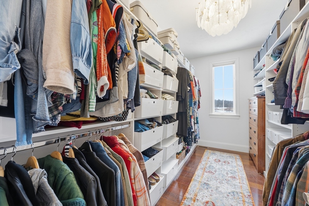 187 Rhode Island Road Lakeville, MA 02347 - Photo 23 of 42 a view of walk in closet with clothes and shoes