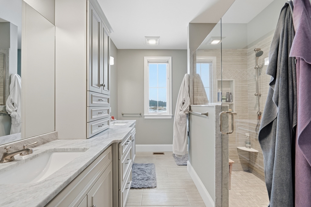 187 Rhode Island Road Lakeville, MA 02347 - Photo 25 of 42 a bathroom with a sink vanity granite tub and shower